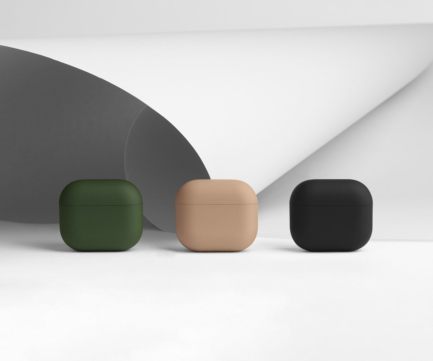 Three 3rd generation Airpods cases by totallee in green, beige, and black