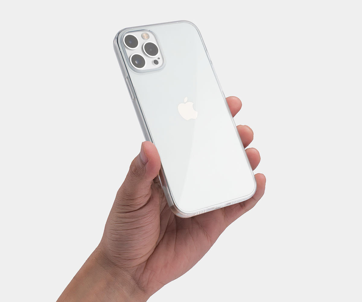 a hand holding a clear iphone 12 pro max case on a silver iphone