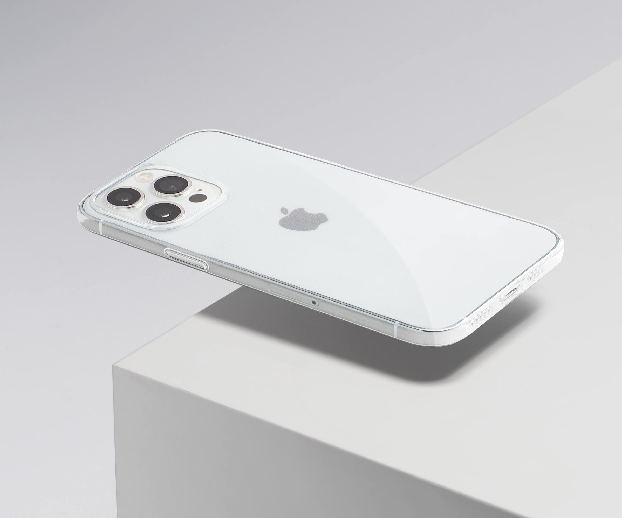 an iPhone 14 Pro Max with a clear case hovering