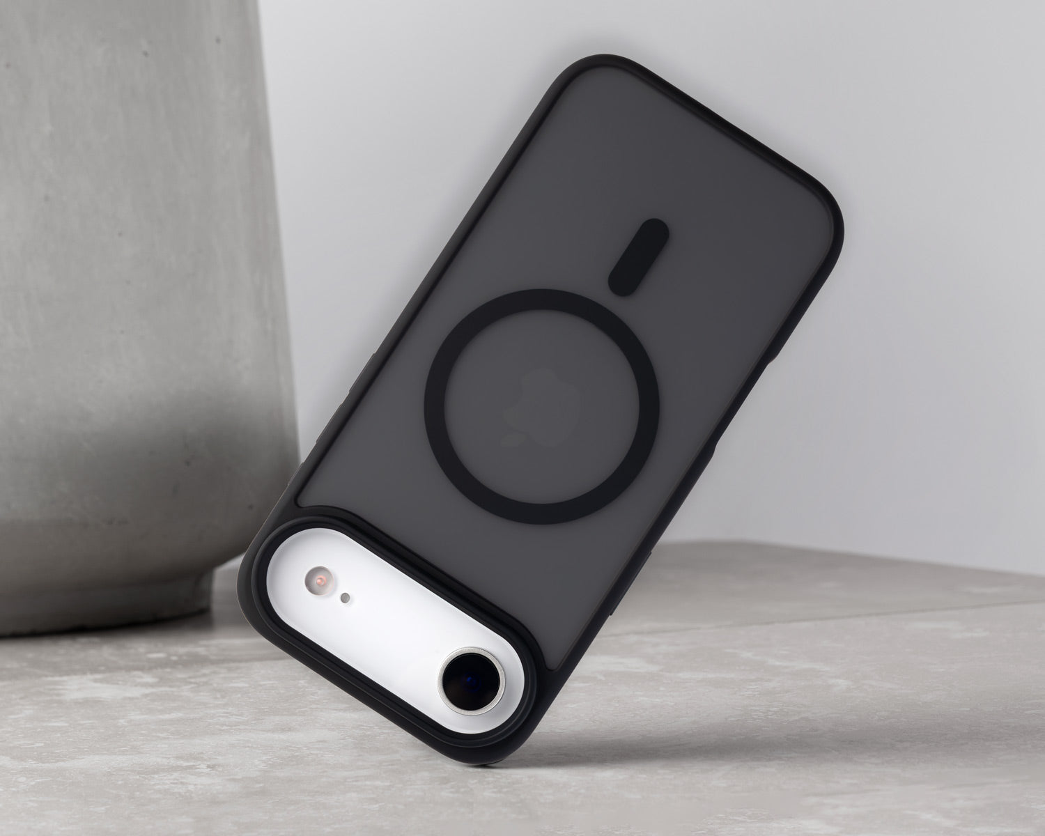 Black phone case with Apple logo on a light gray background