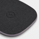 Close up view of the fast wireless charger by totallee showing the minimalistic design and grey color